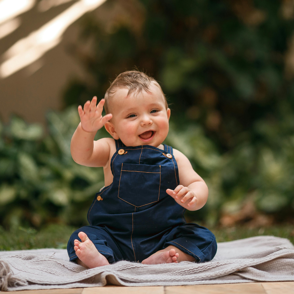 When Do Babies Start Waving Goodbye?